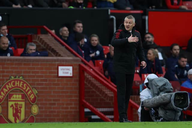 MANCHESTER, ENGLAND - NOVEMBER 06: Ole Gunnar Solskjaer, Manager of Manchester United gives their team instructions during the Premier League match between Manchester United and Manchester City at Old Trafford on November 06, 2021 in Manchester, England. (Photo by Clive Brunskill/Getty Images)