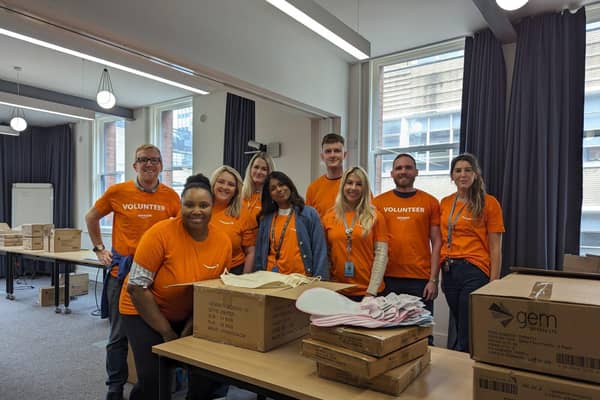Amazon team pack thousands of new baby kits to donate to Wigan Multibank