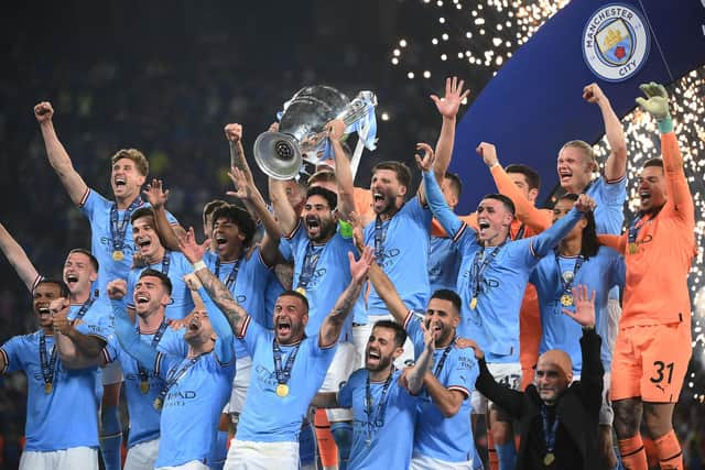 Manchester City players following Saturday's Champions League success to wrap up a trophy treble