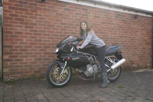 Kate on her Ducati before the restoration