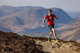 Alex running on Fleetwith Pike, The Lake District. Photo Credit: Dave MacFarlane.