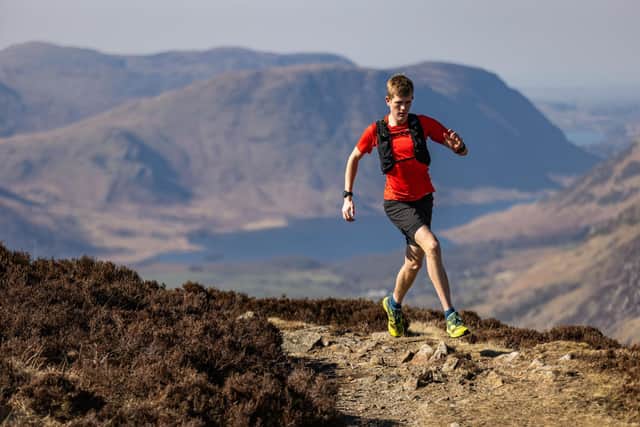 Alex running on Fleetwith Pike, The Lake District. Photo Credit: Dave MacFarlane.