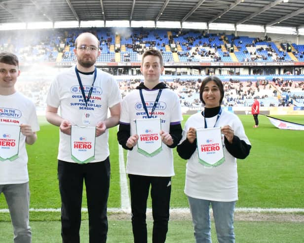 Charlie Watts (Second in from left) stood pitchside before Saturday's victory against Leyton Orient