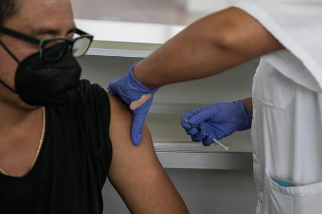 A person received a dose of the Pfizer Covid vaccine. Picture: Zowy Voeten/Getty Images
