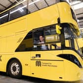 Greater Manchester mayor Andy Burnham inside one of the new Bee Network buses.