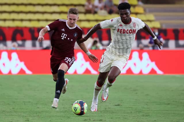 Monaco's French midfielder Aurelien Tchouameni (R) fights for the ball with Sparta Tomas Wiesner (L) during the Champions League match Q3 football match between AS Monaco and AC Sparta Praha at "Louis II" stadium in Monaco, on August 10, 2021. (Photo by Valery HACHE / AFP) (Photo by VALERY HACHE/AFP via Getty Images)