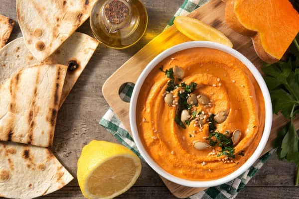 Why not try this delicious pumpkin hummus recipe? Photo credit: Getty Images/Canva Pro