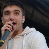 Singer Tom Parker on stage with The Wanted at the Tower Headland, Blackpool, 2012