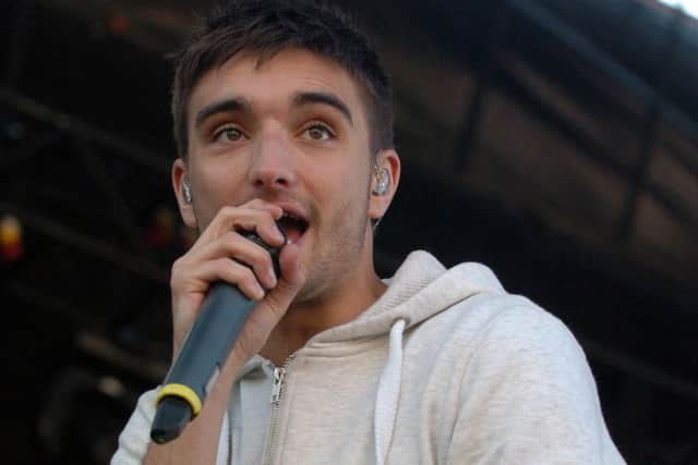 Singer Tom Parker on stage with The Wanted at the Tower Headland, Blackpool, 2012