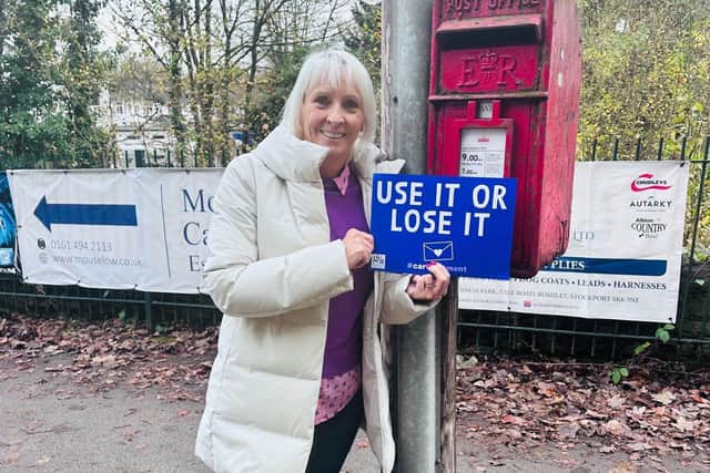 Karen Wilson in support of the GCA ‘Use it or lose it’ campaign and signing the petition to force greater parliamentary scrutiny of planned changes to the postal service