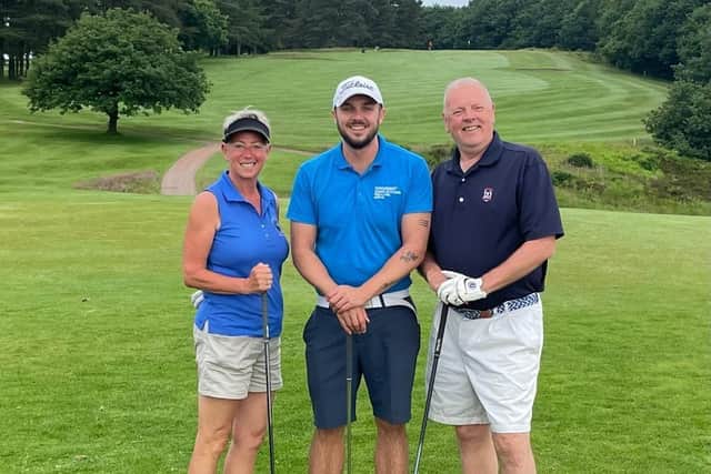Joshua (middle) taking part in his golf challenge in support of Parkinson’s UK