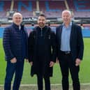 New partnership - (from left) Findel ambassador, Mike Phelan; Burnley FC in the Community's head of partnerships and fundraising, Ben Bottomley; and Findel CEO, Chris Mahady