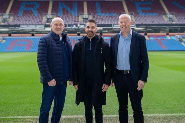 New partnership - (from left) Findel ambassador, Mike Phelan; Burnley FC in the Community's head of partnerships and fundraising, Ben Bottomley; and Findel CEO, Chris Mahady