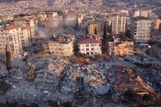 An aerial photo shows collapsed buildings in Antakya on February 11, 2023, after a 7.8-magnitude earthquake struck the country's southeast  (Photo by Hassan AYADI / AFP) (Photo by HASSAN AYADI/AFP via Getty Images)