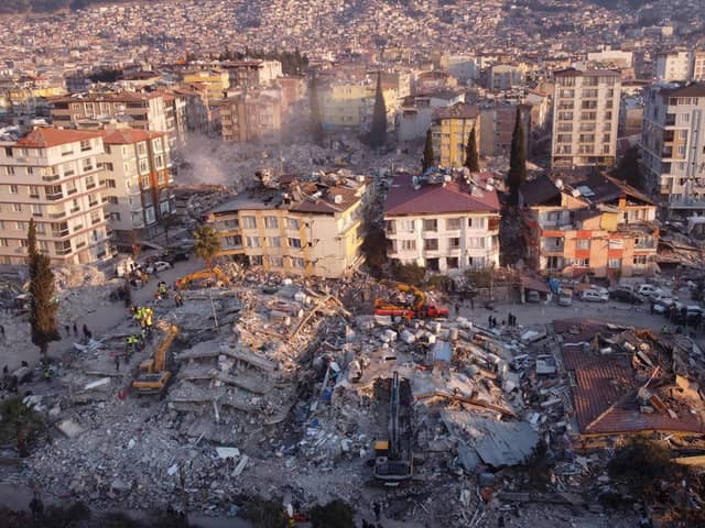 An aerial photo shows collapsed buildings in Antakya on February 11, 2023, after a 7.8-magnitude earthquake struck the country's southeast  (Photo by Hassan AYADI / AFP) (Photo by HASSAN AYADI/AFP via Getty Images)