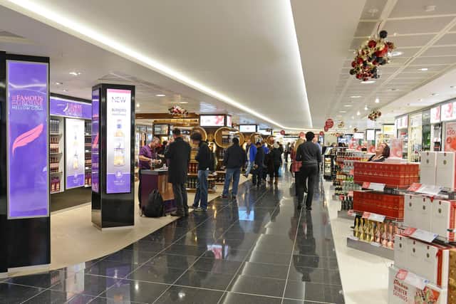 A carrier bag from a duty-free store can be useful to boost your hand luggage. Credit: Neil Hanna Photography