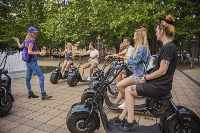 Listening to information on Budapest from the Luna Tours guide. Image: Eduardo Munoz Norambuena